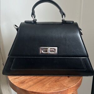 BCBG small Black Handbag with silver accents missing strap